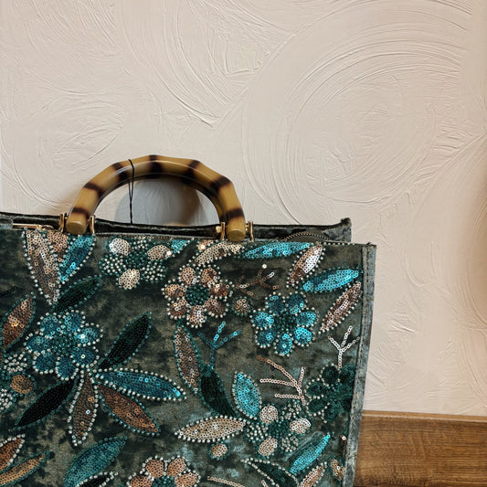 Groene tas met glitter borduursel