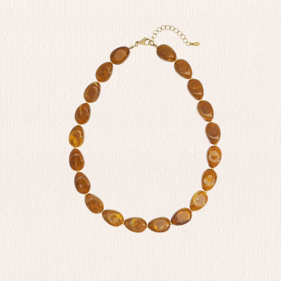 Lichtbruine kralenketting acryl