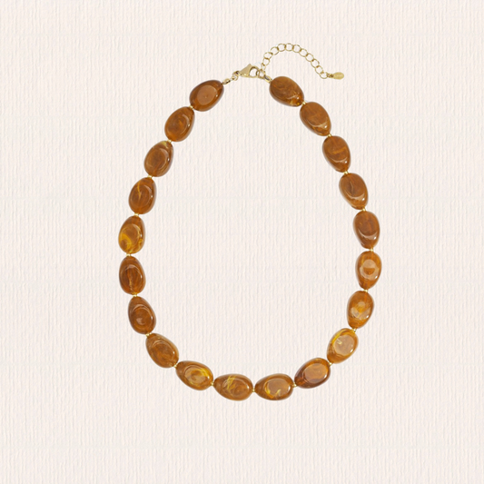 Lichtbruine kralenketting acryl