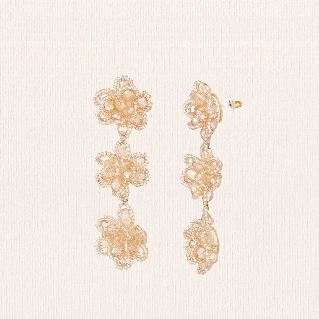 Bloemen oorbellen glitter beige