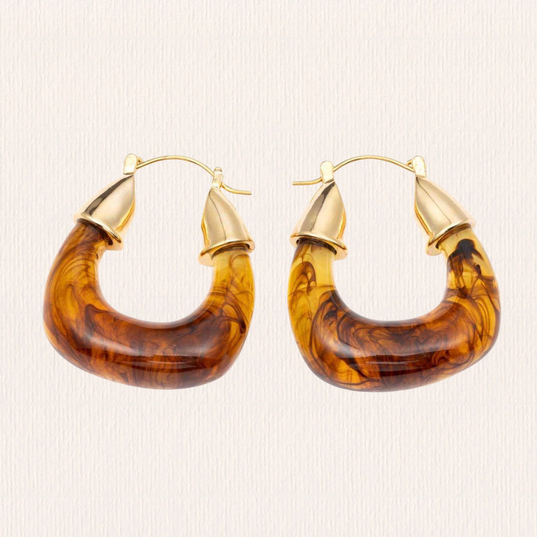 Bruine oorbellen druppel