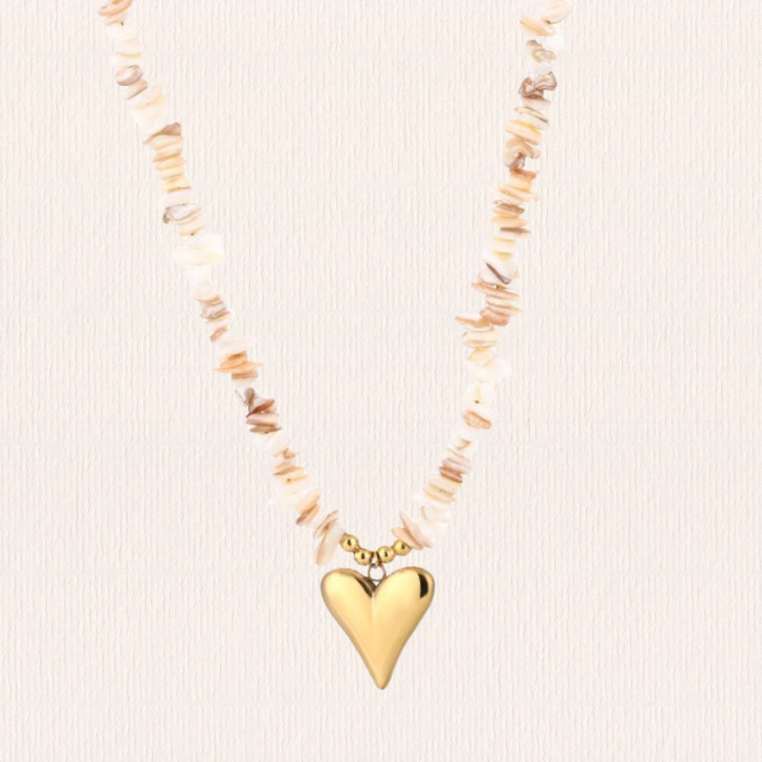Beige kralenketting met hart