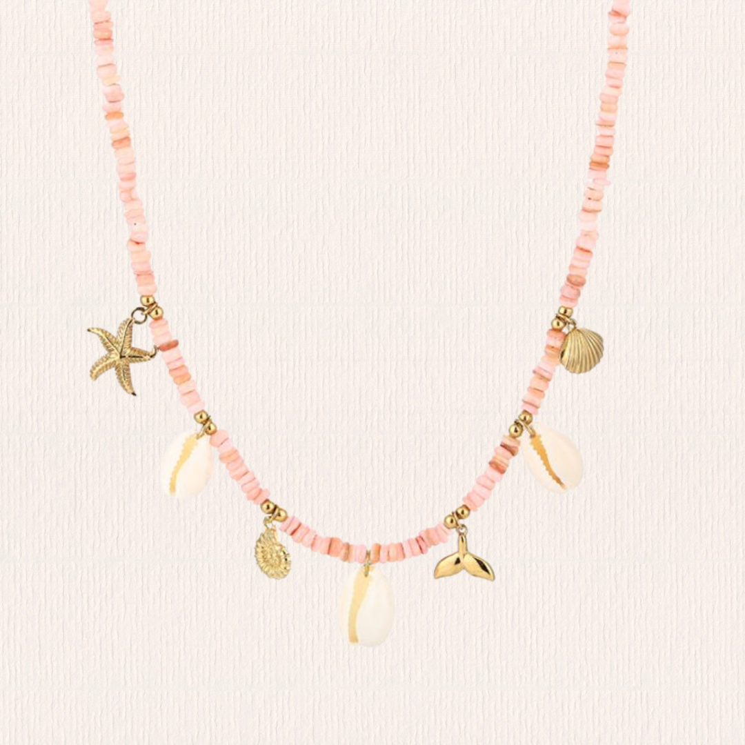 Roze kralenketting zeethema