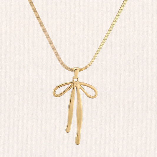 Gouden ketting strik