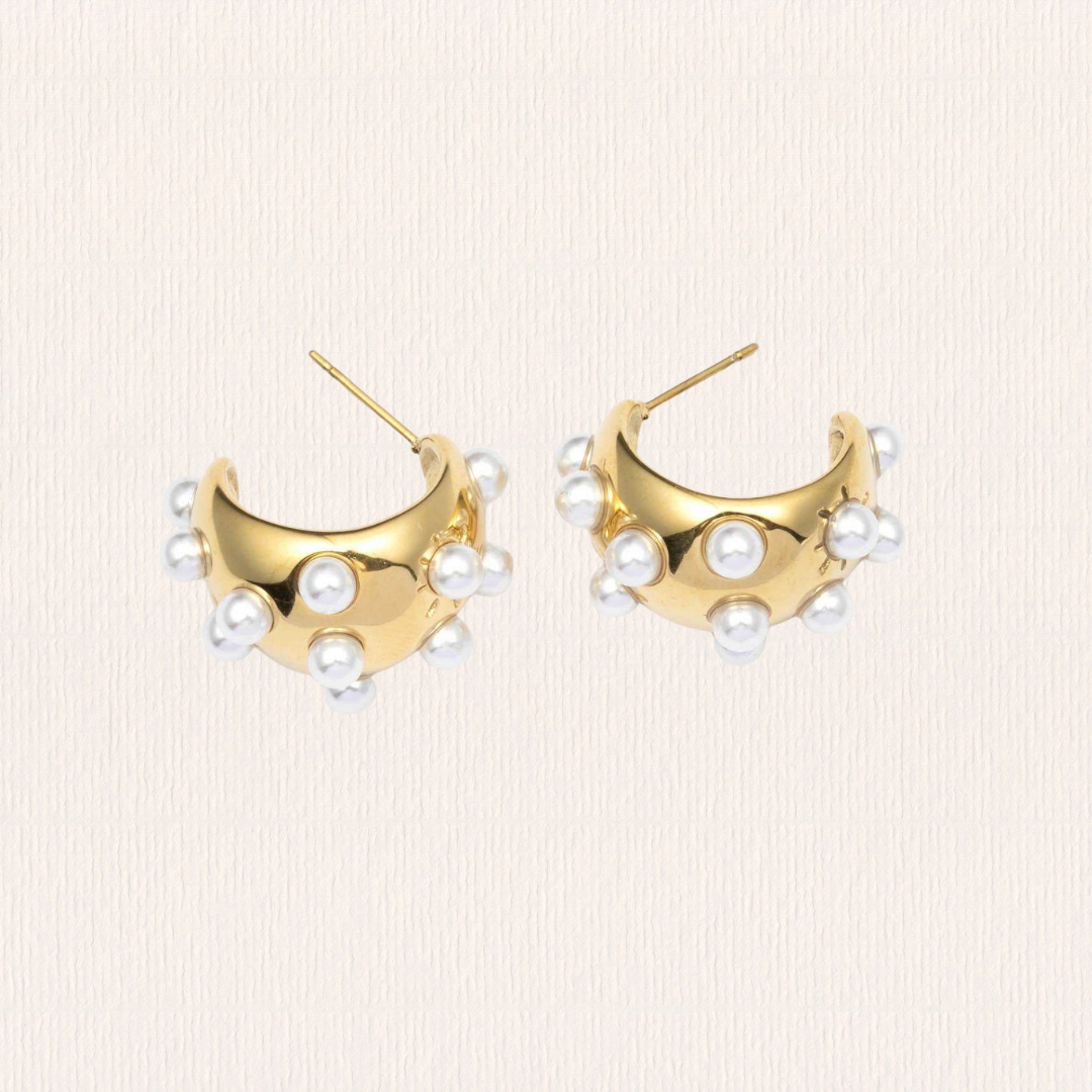 Gouden oorbellen parels