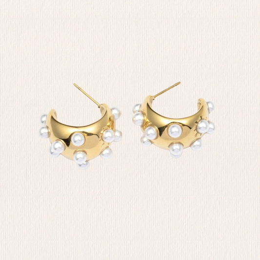 Gouden oorbellen parels