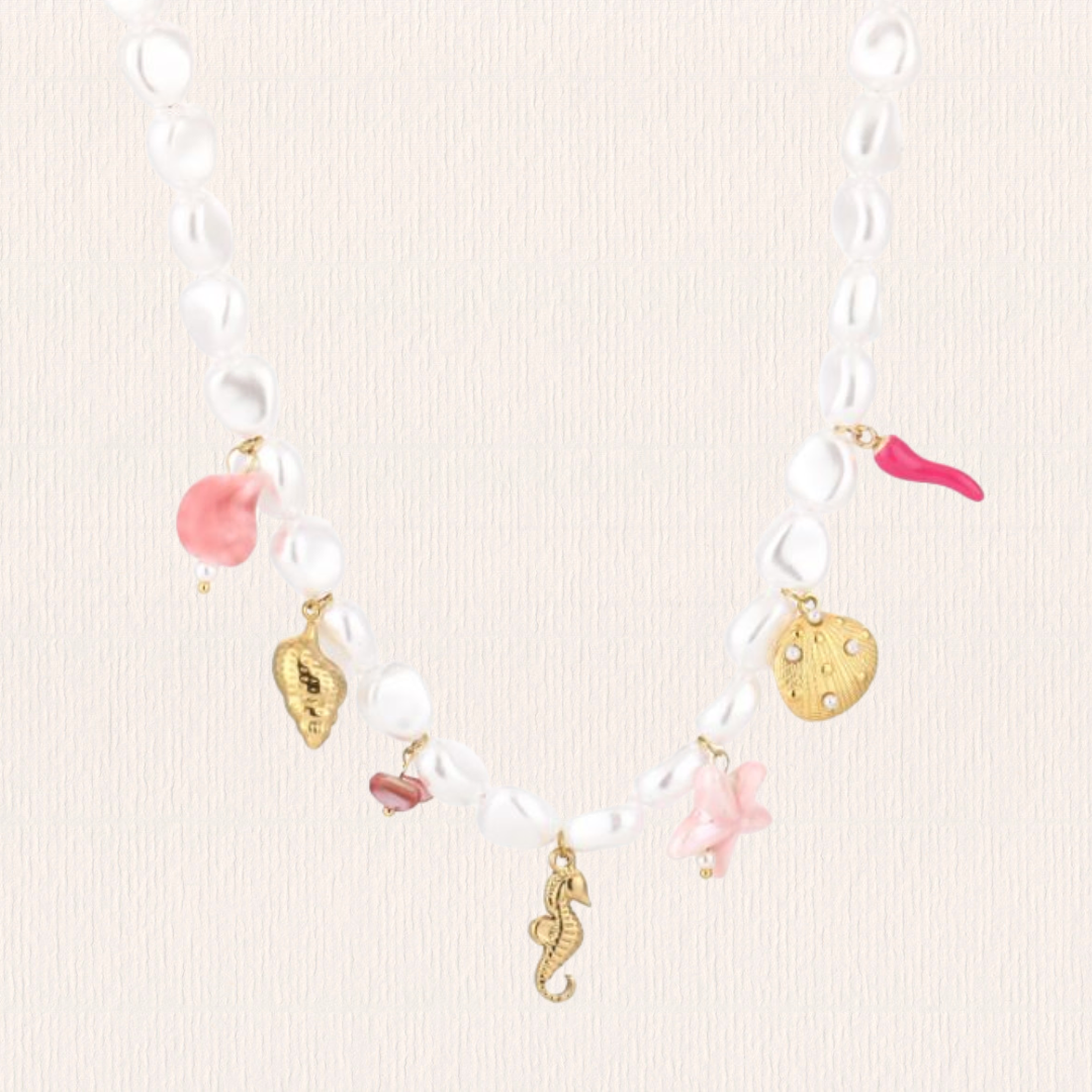Parelketting met roze bedeltjes
