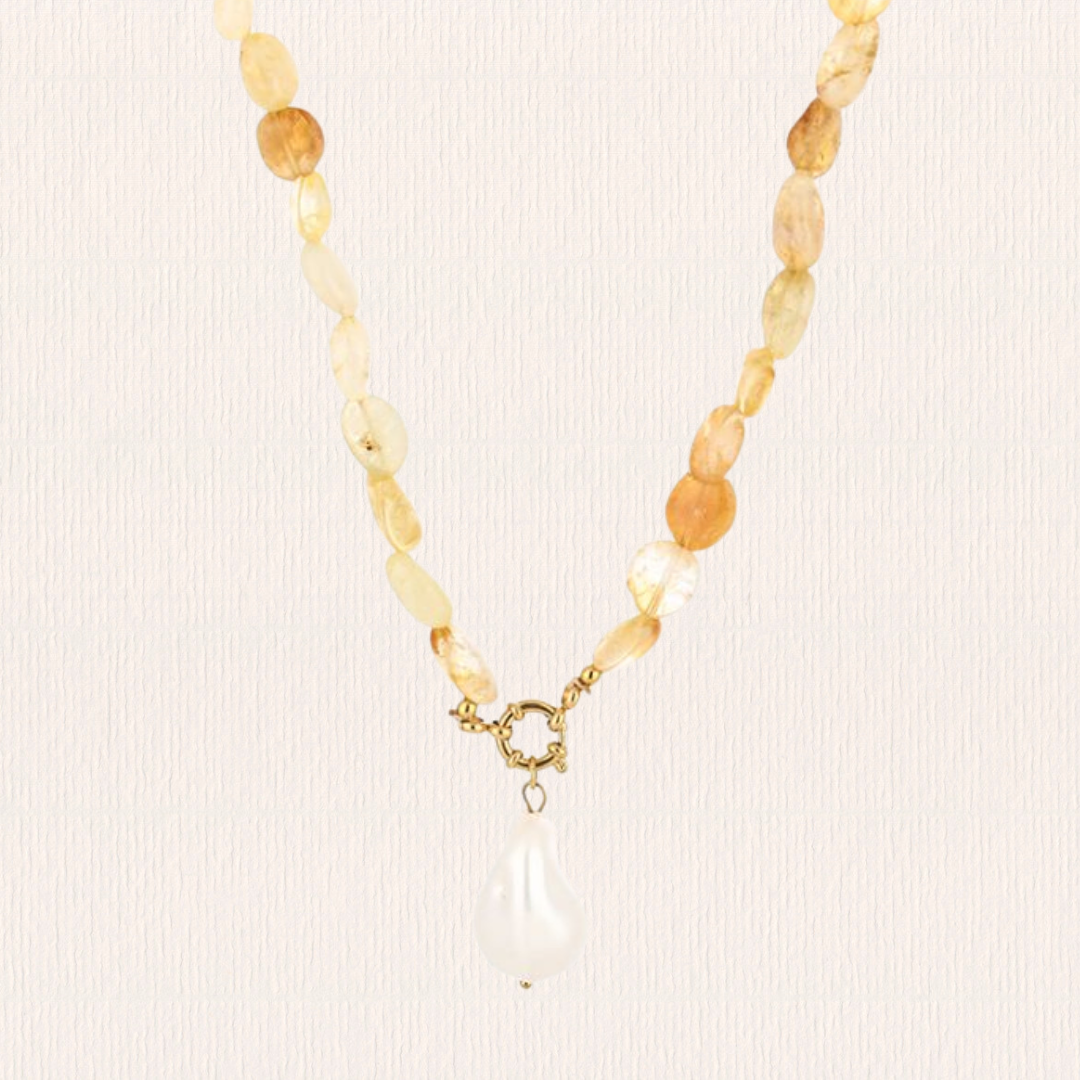 Gele kralenketting met parel bedel