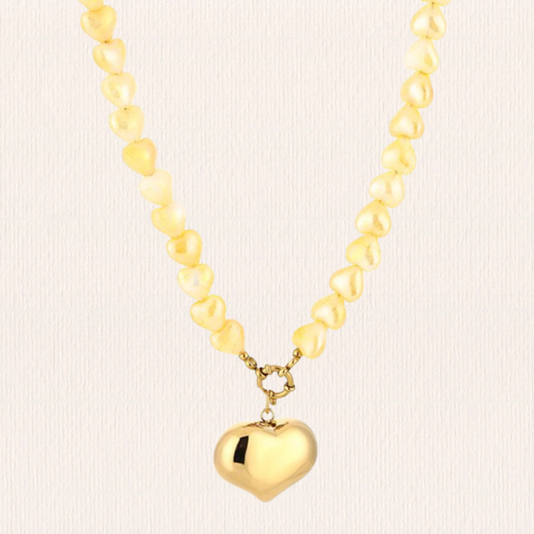 Hartjes ketting met bedel geel