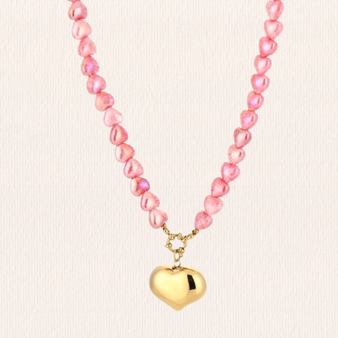 Hartjes ketting met bedel roze