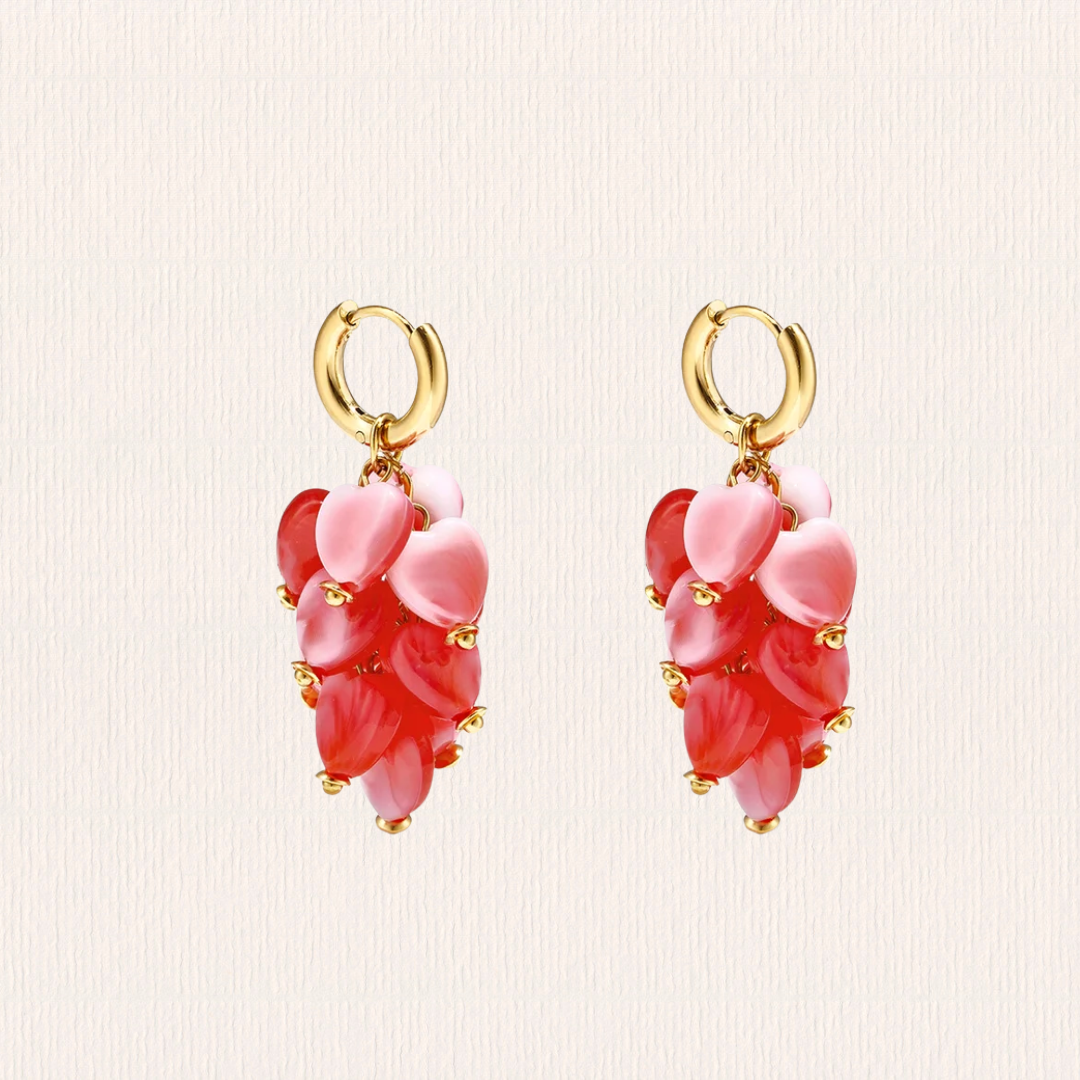 Oorbellen met hangende hartjes rood/ roze