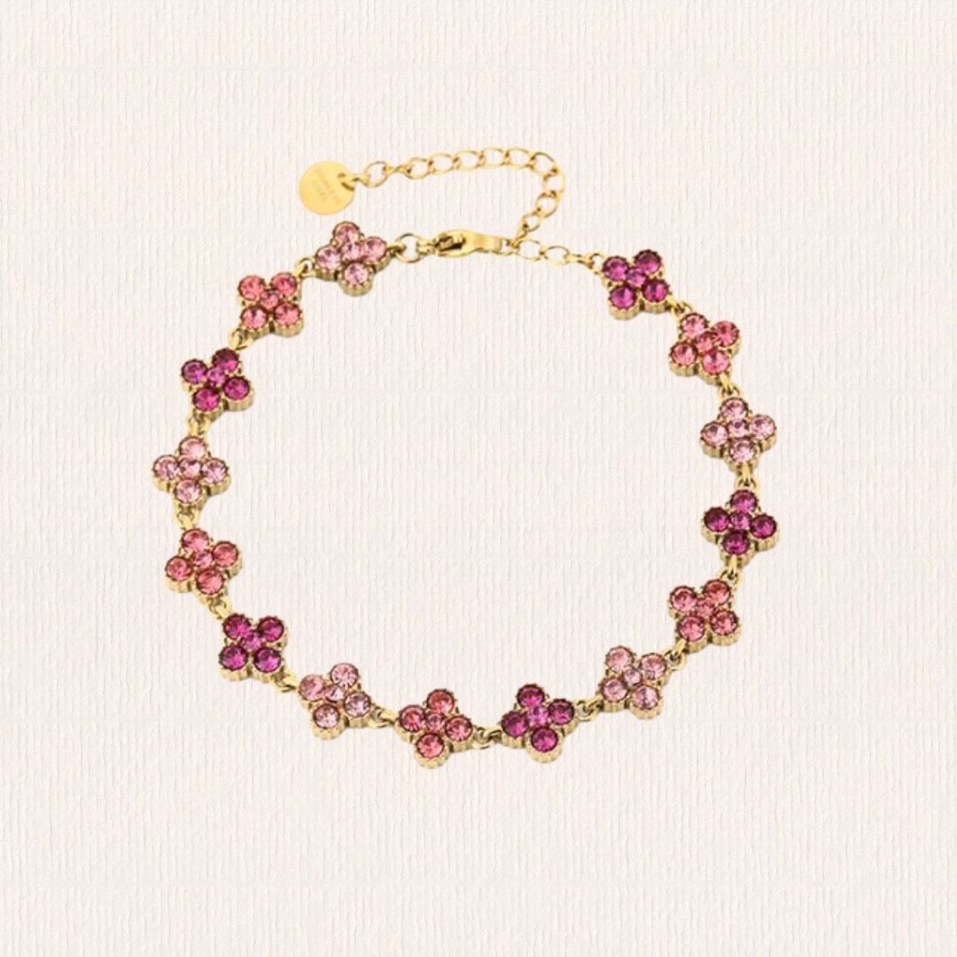 Gouden met roze klaverarmband