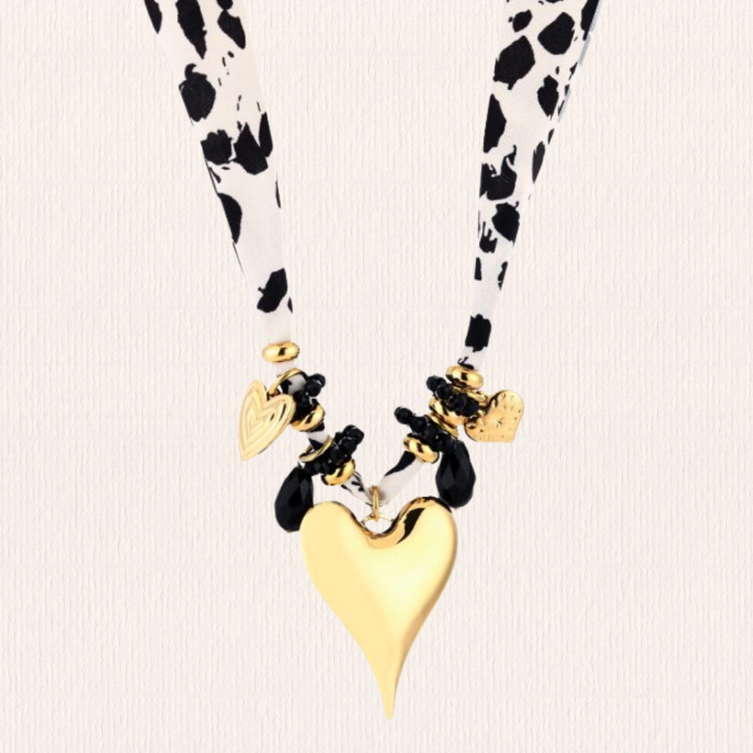 Koeienprint bedelketting van stof