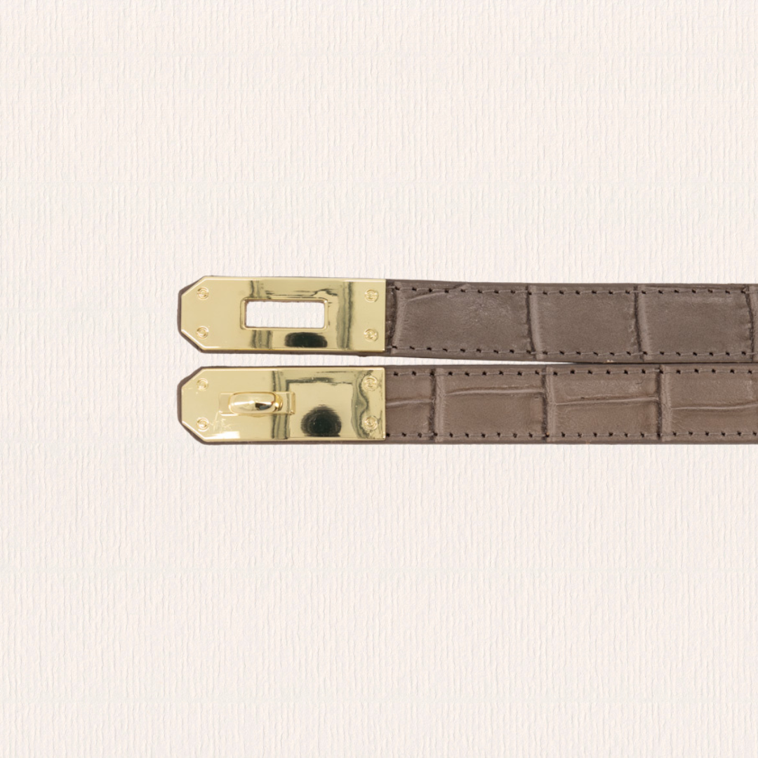 Taupe verstelbare riem met draaisluiting