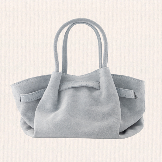 Lichtblauw handtasje met goud detail