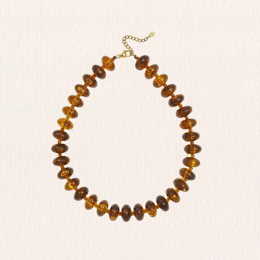Acryl kralenketting bruin ovaal