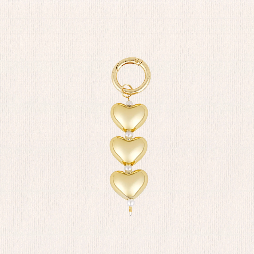 Tasbedeltje met gouden hartjes