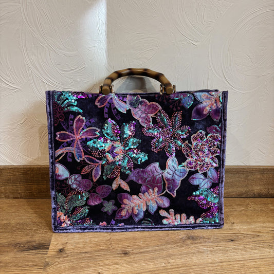 Paarse tas met glitter borduursel