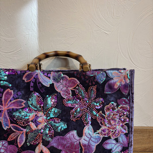 Paarse tas met glitter borduursel