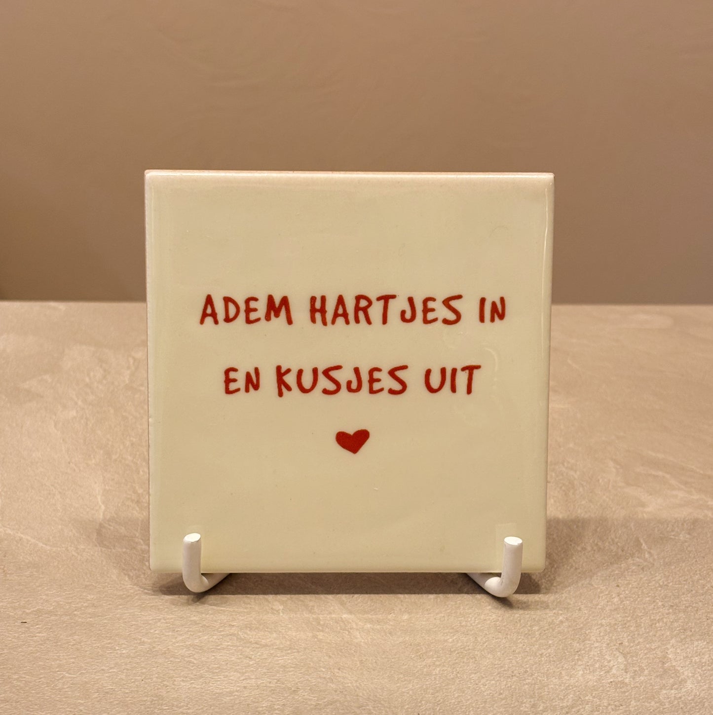 Adem hartjes in tegeltje