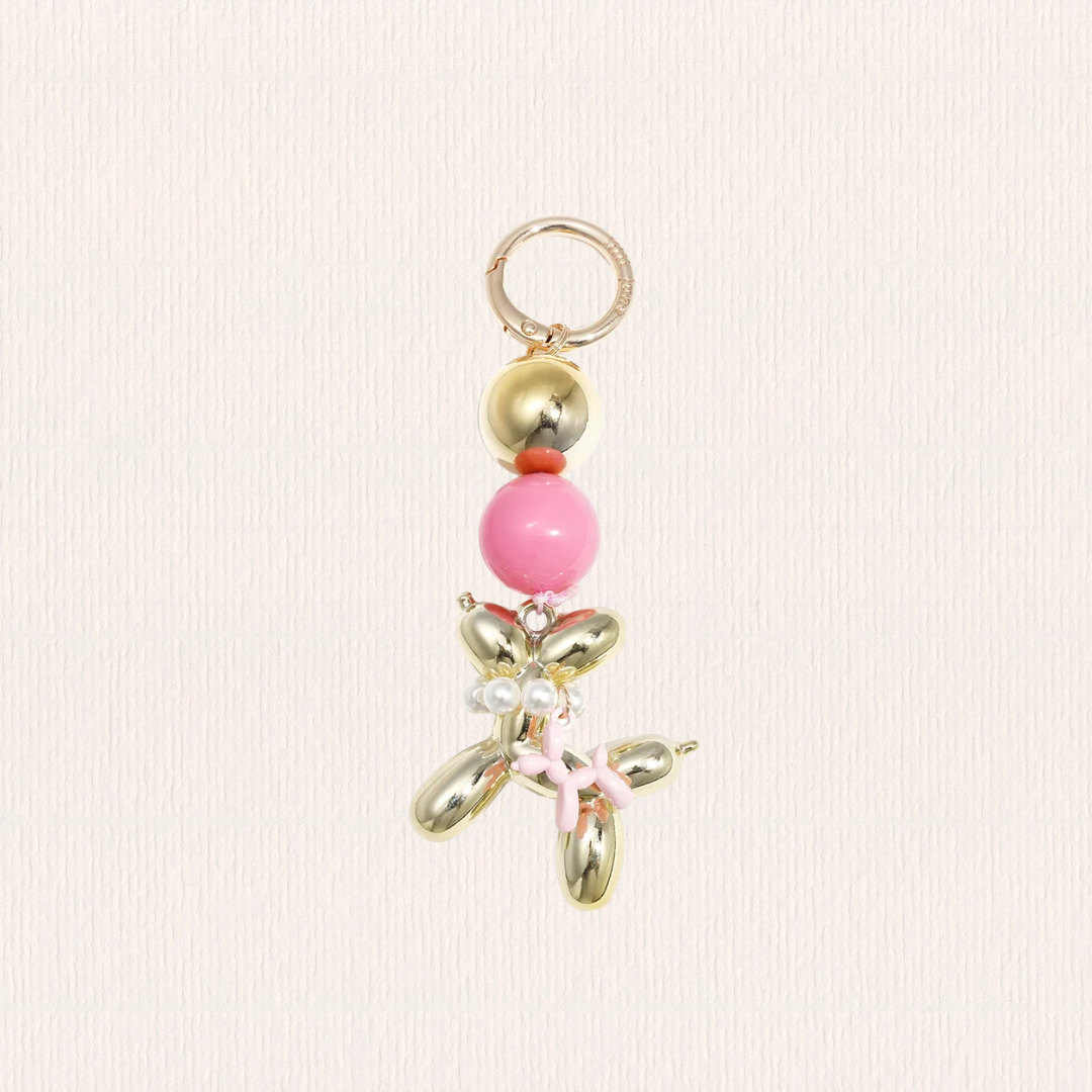 Tasbedeltje met balonhondje roze