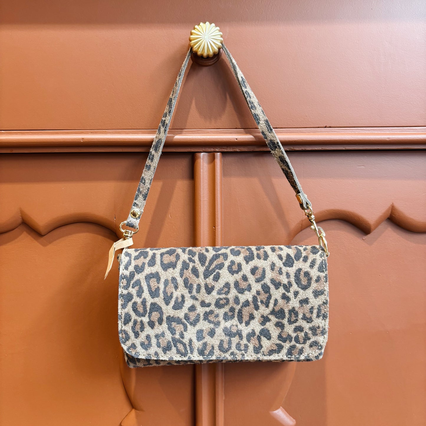 Panterprint suede clutch