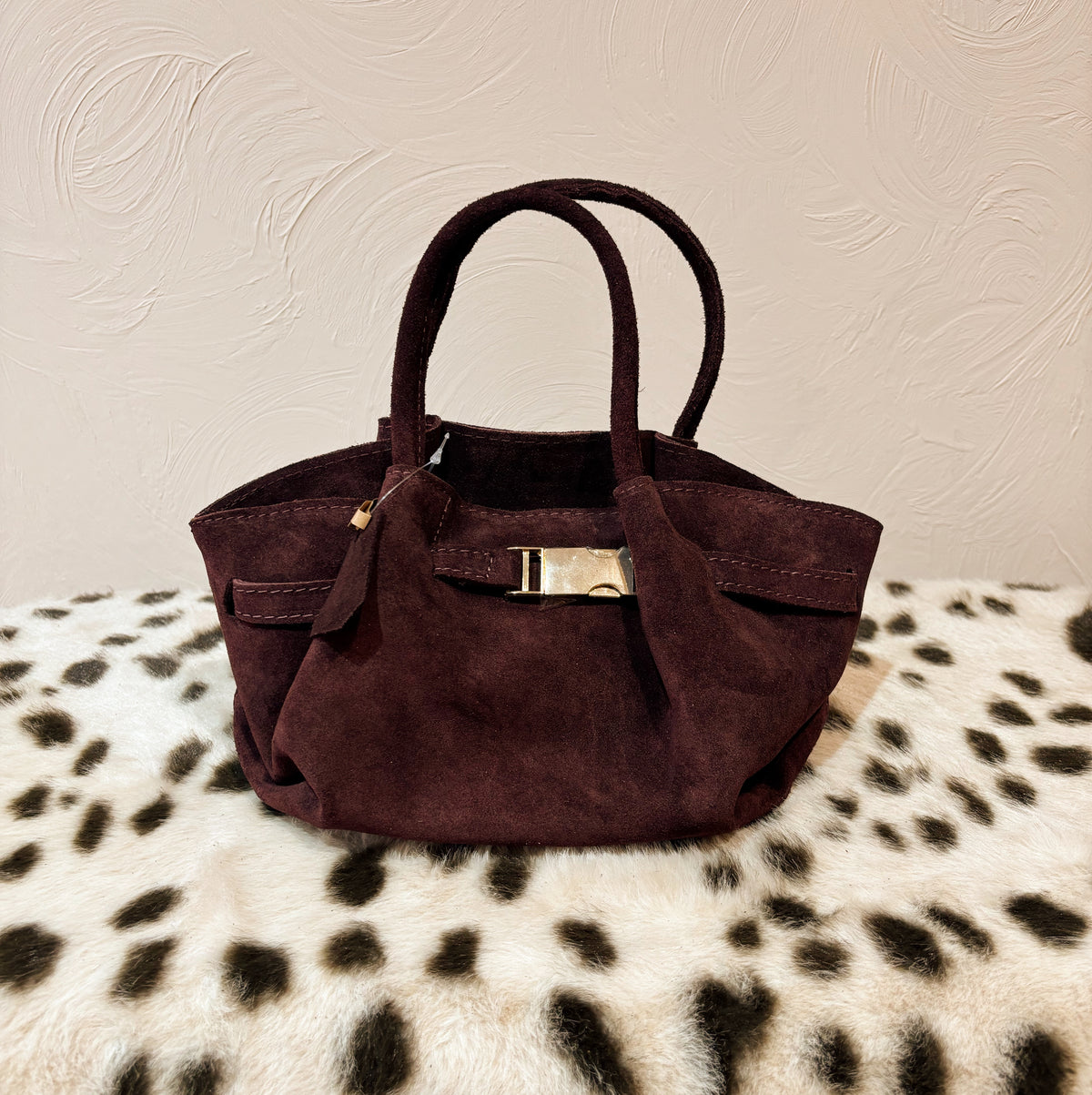 Bordeaux handtasje met goud detail