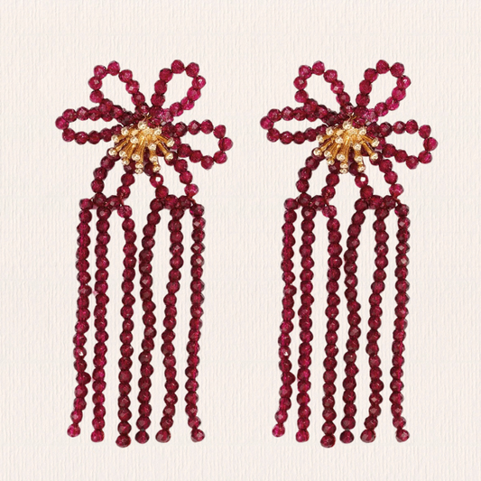 Statement bloem oorbellen met franjes rood