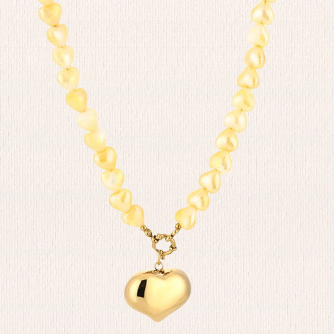 Hartjes ketting met bedel geel