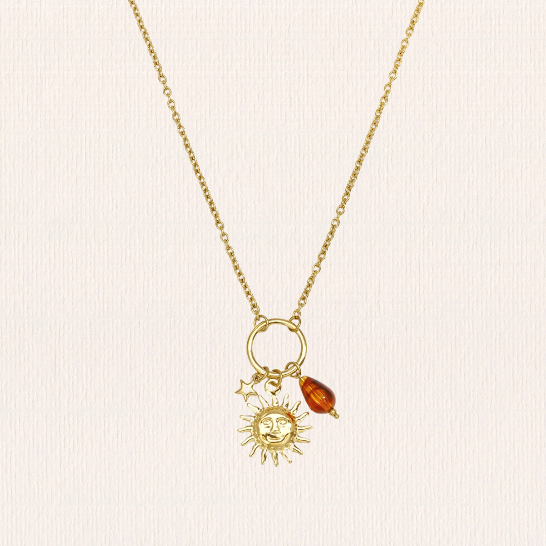 Gouden ketting met zon bedel