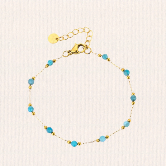 Armbandje met blauwe kraaltjes