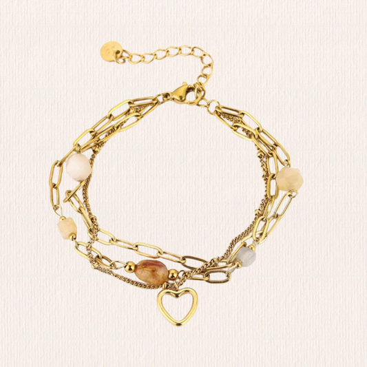 Dubbele armband met stenen en hartje geel