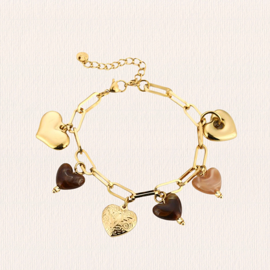 Bedelarmbandje hartjes beige