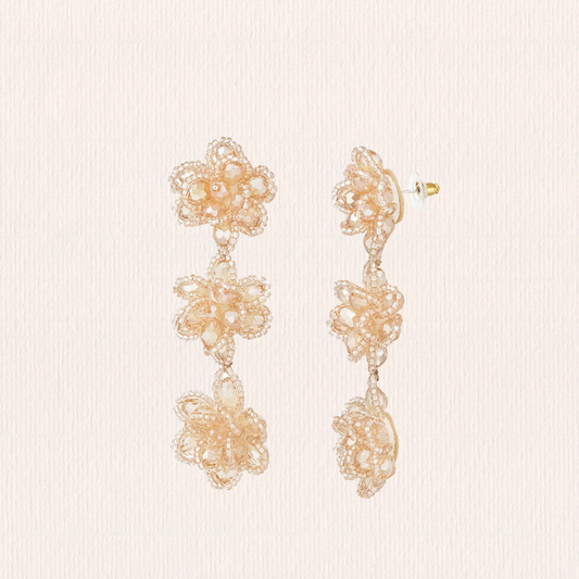 Bloemen oorbellen glitter beige