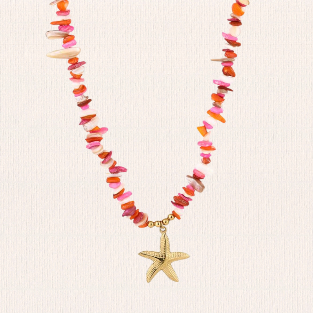 Roze kralenketting met ster