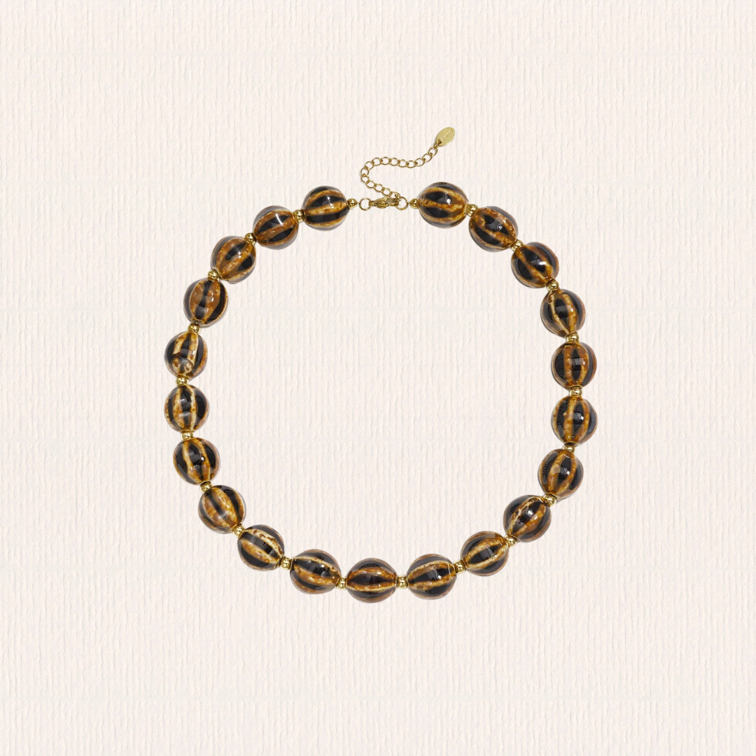 Gevlekte bruine kralenketting