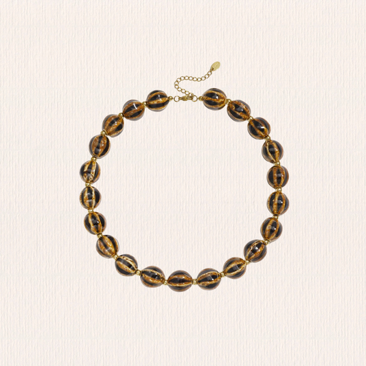 Gevlekte bruine kralenketting
