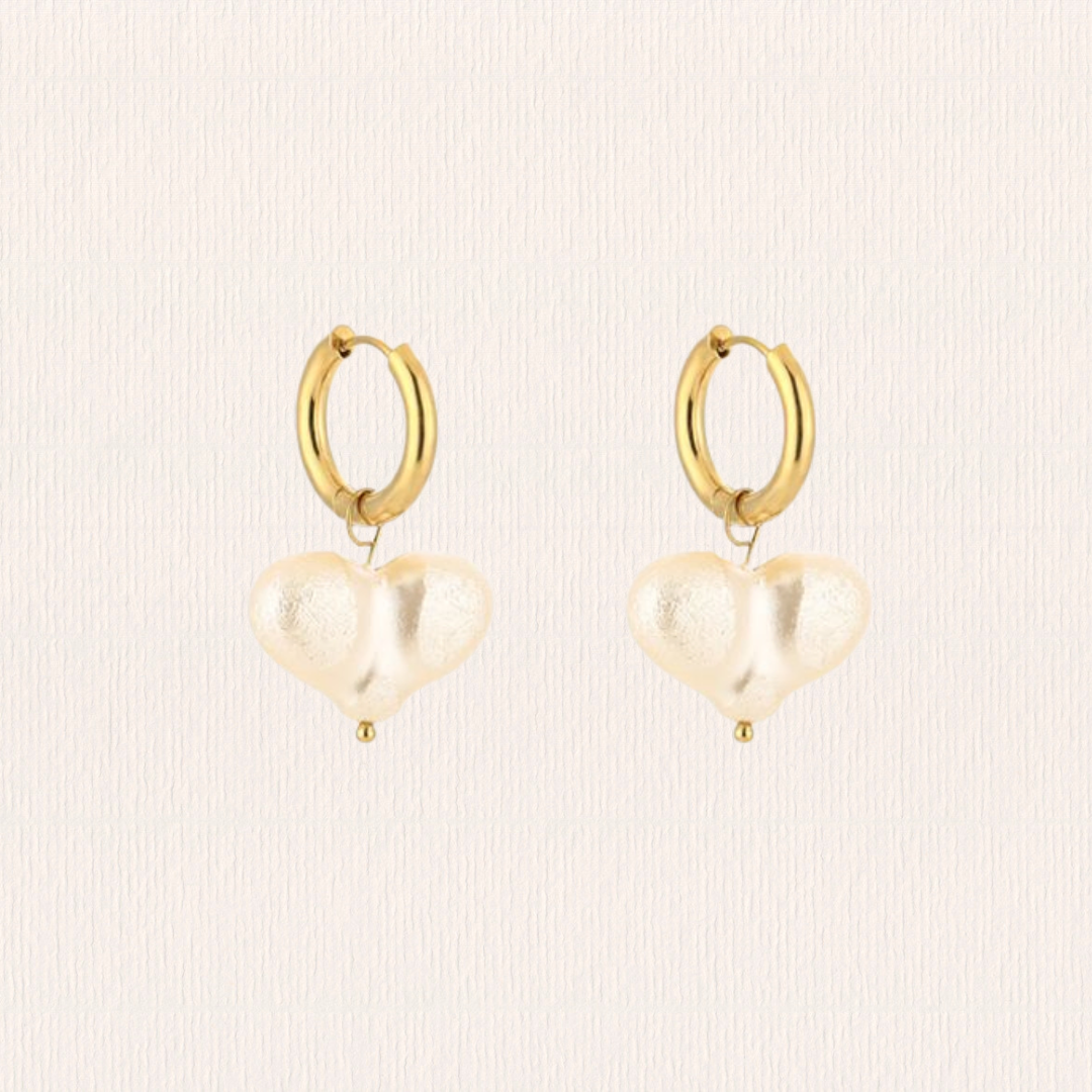 Oorbellen met parel hartjes