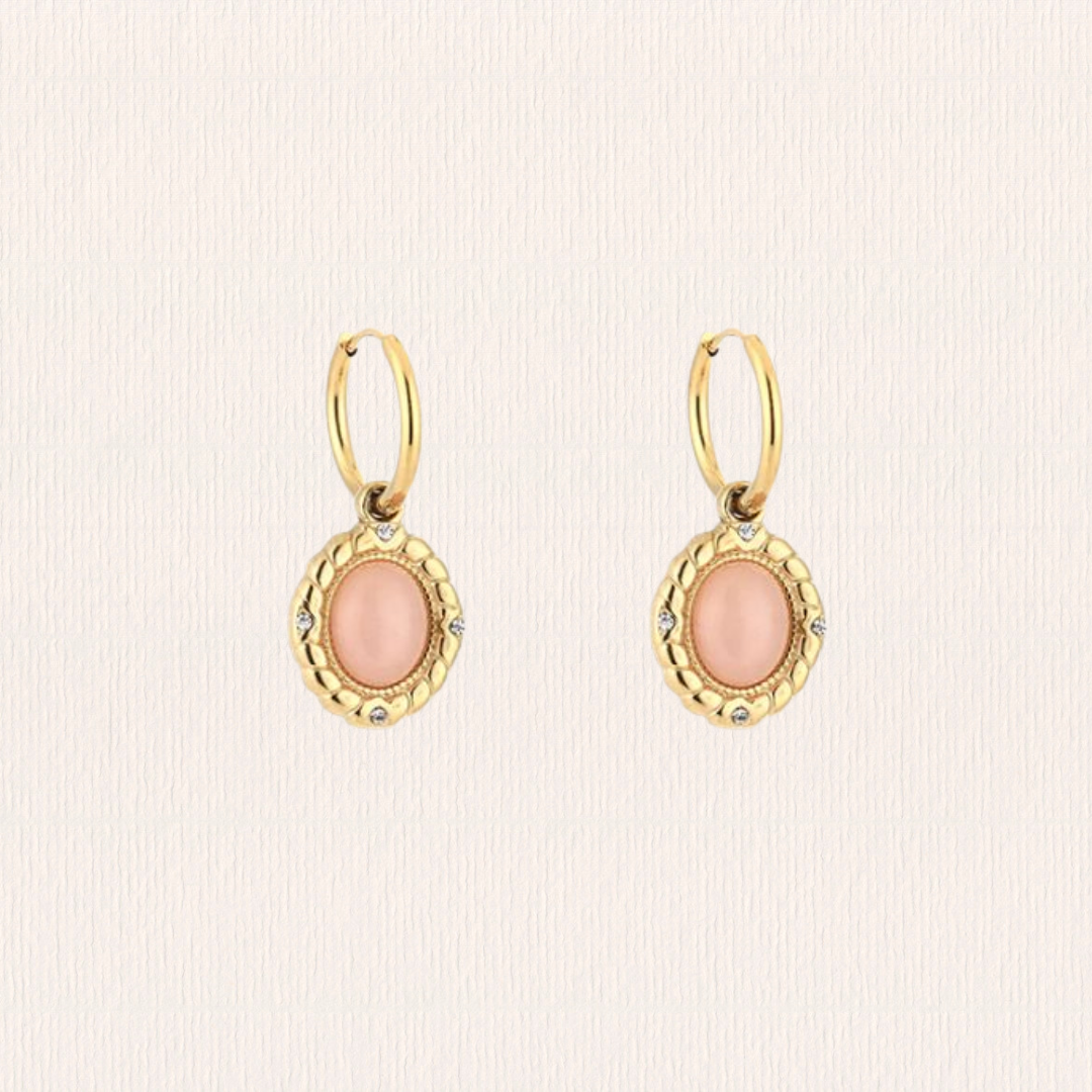 Gouden oorbellen met roze steentje