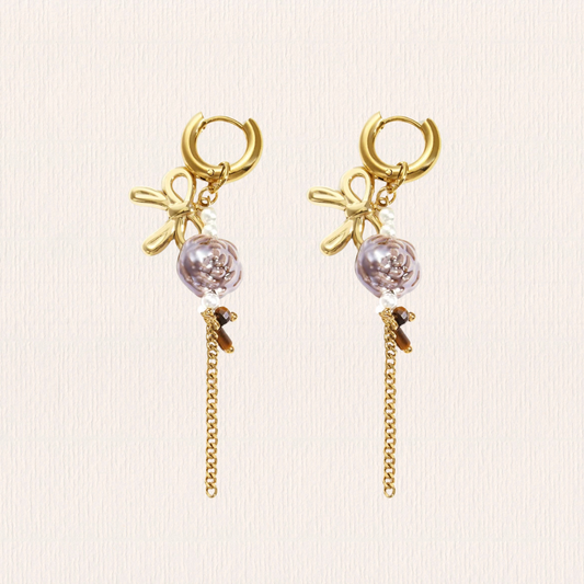 Strikjes en parel oorbellen