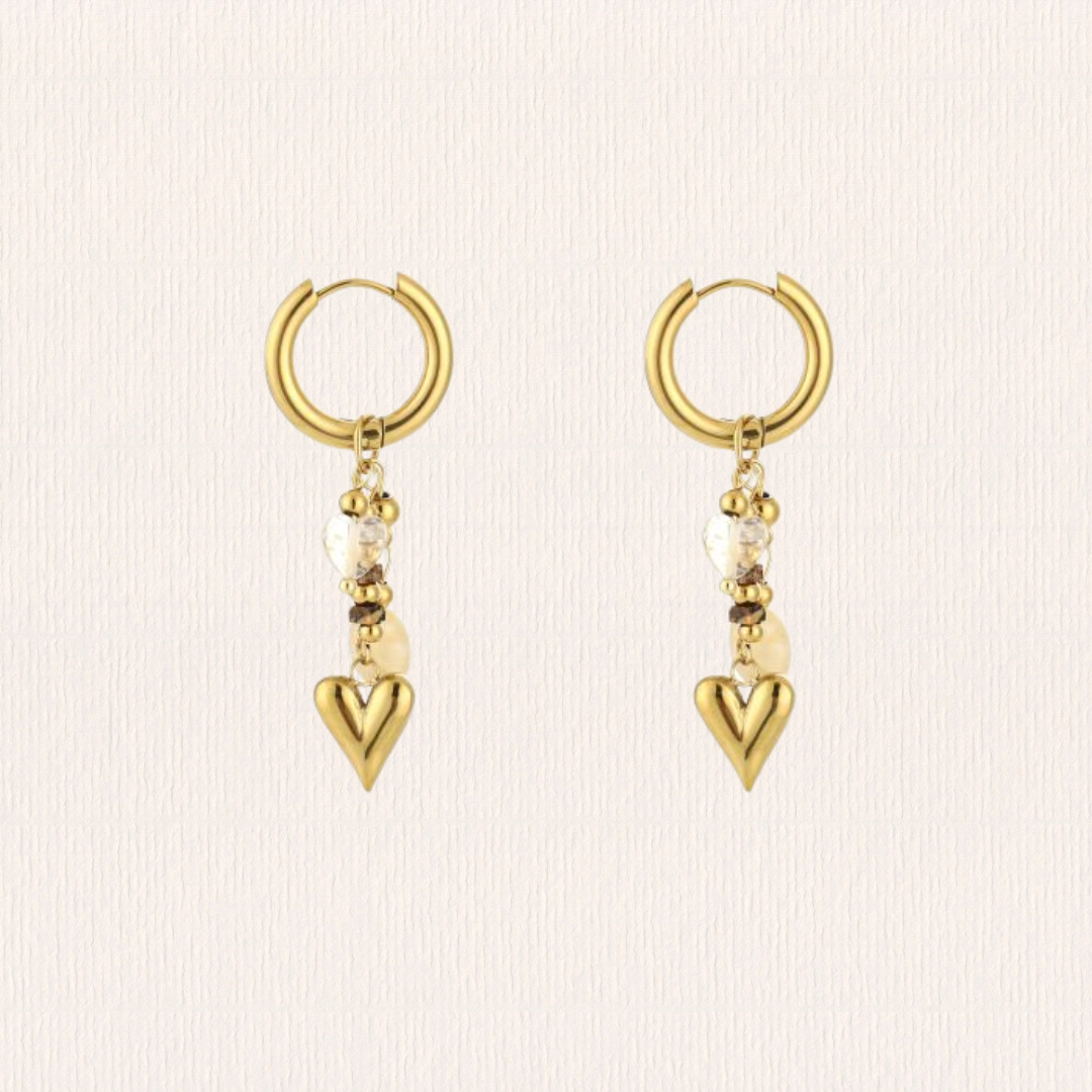 Lange hartjes natuursteenoorbellen - beige