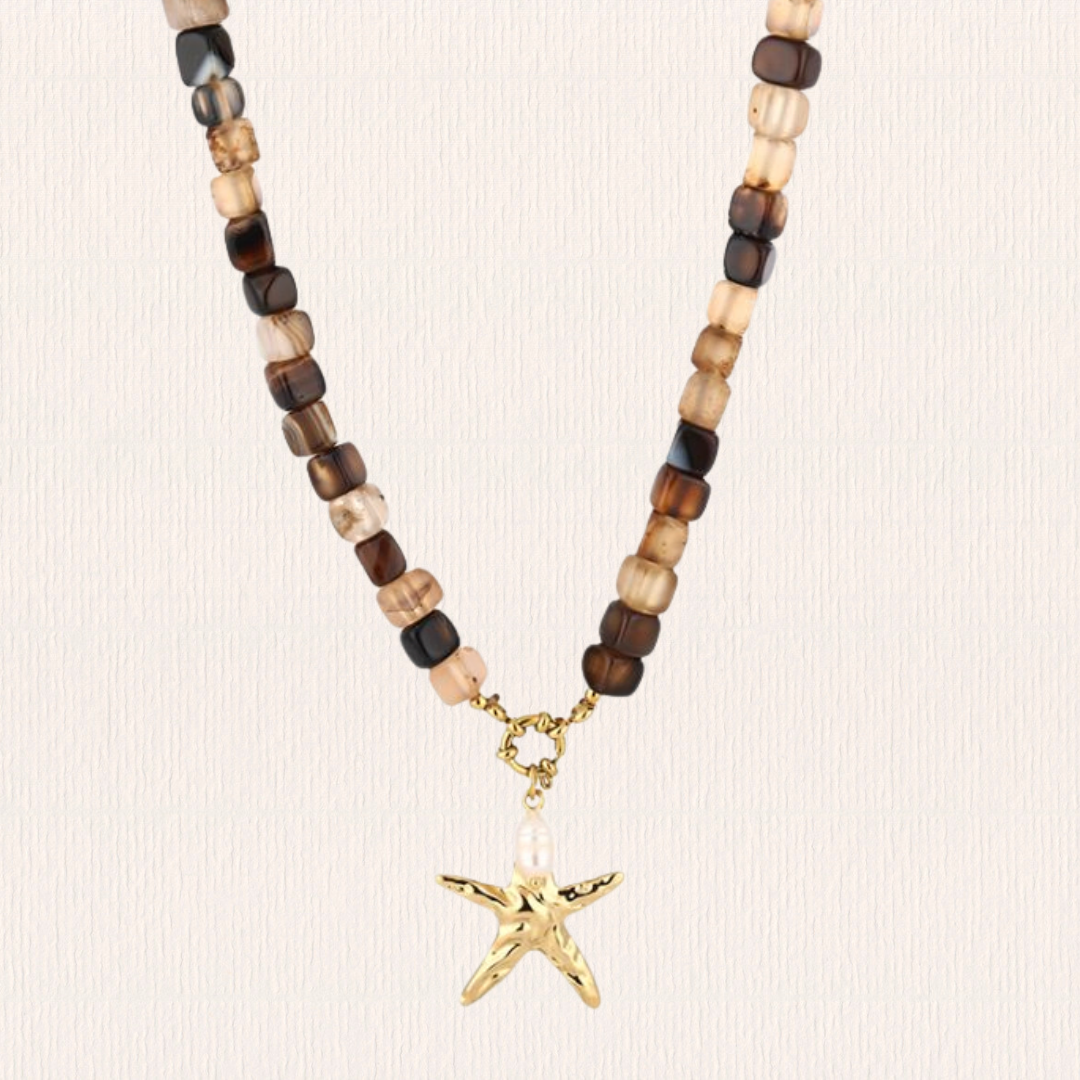 Bruine kralenketting met ster bedel