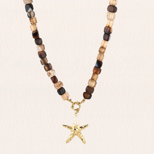Bruine kralenketting met ster bedel