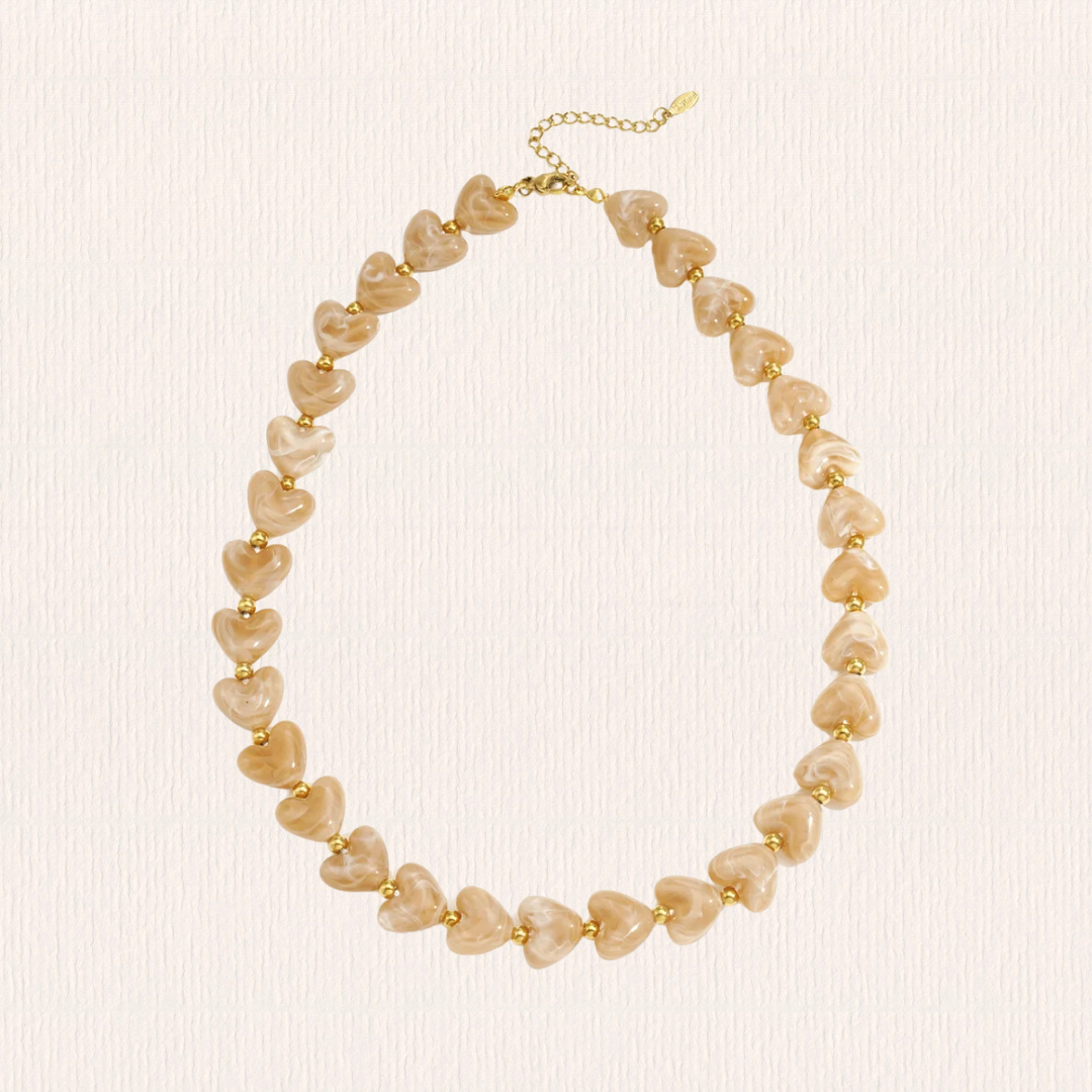 Hartjes ketting beige
