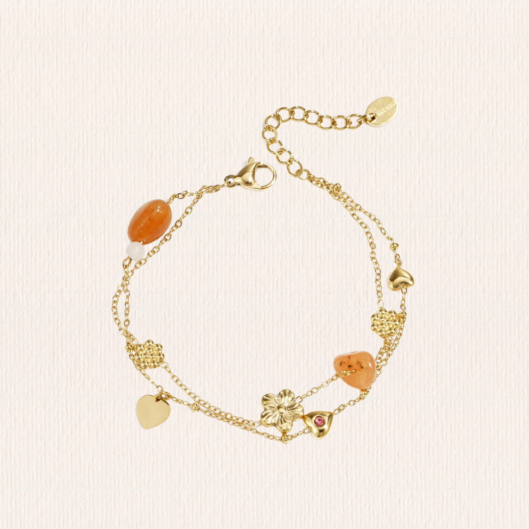 Bedelarmbandje met oranje kralen