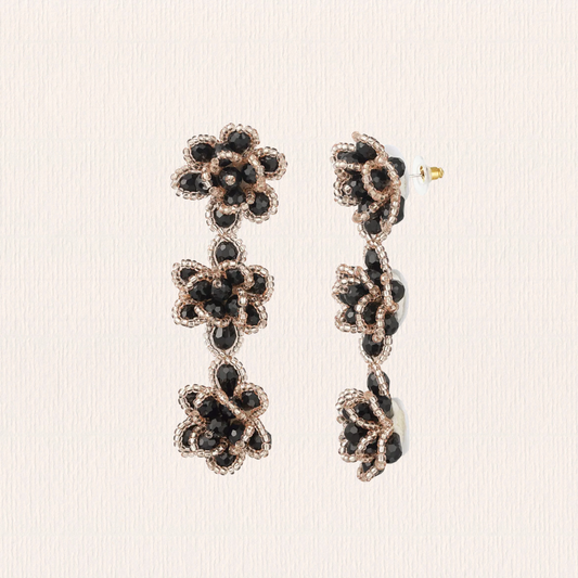 Bloemen oorbellen glitter zwart-goud