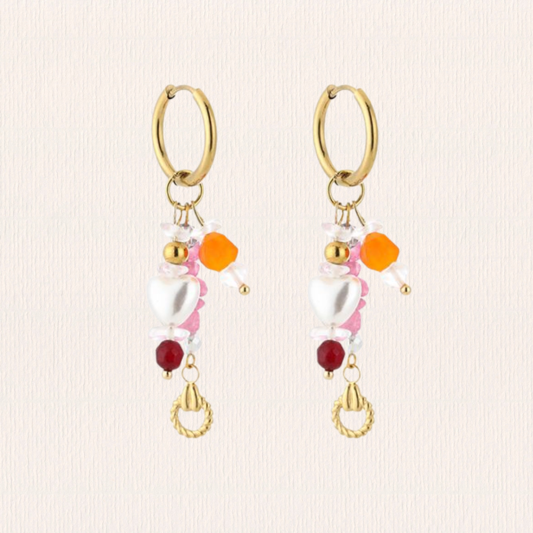 Gouden oorbellen met roze bedels