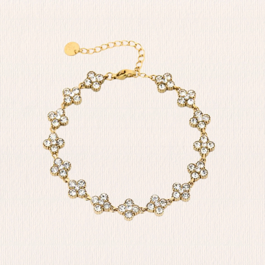 Gouden met witte klaverarmband