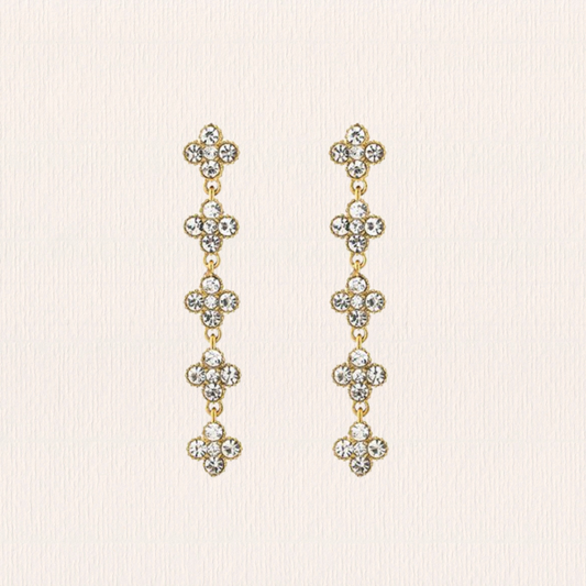 Gouden met witte klaveroorbellen