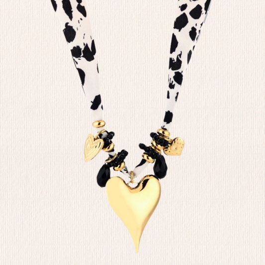 Koeienprint bedelketting van stof